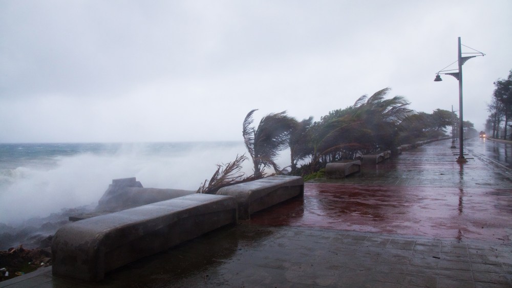 Strong winds and waves batter the coast as tropical storm Erika approaches Santo Domingo, Dominican Republic, Aug. 28, 2015. (Photo by Tatiana Fernandez/AP)