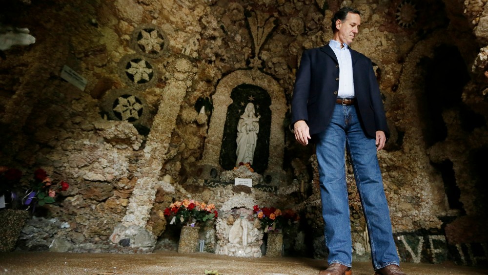Republican presidential candidate, former Pennsylvania Sen. Rick Santorum tours the Shrine of the Grotto of the Redemption, Sunday, Aug. 23, 2015, in West Bend, Iowa. (Photo by Charlie Neibergall/AP)