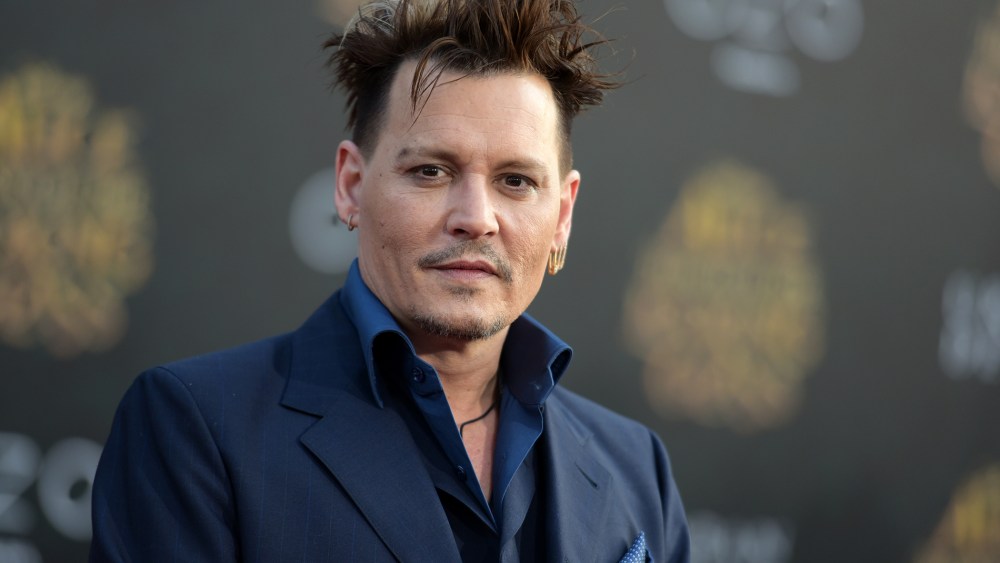 Johnny Depp arrives at the premiere of "Alice Through the Looking Glass" at the El Capitan Theatre on May 23, 2016, in Los Angeles, Calif. (Photo by Richard Shotwell/Invision/AP)