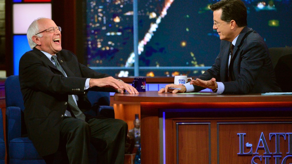 Senator and Democratic candidate for president, Bernie Sanders, left, joins host Stephen Colbert on the set of "The Late Show with Stephen Colbert," on Sept. 18, 2015 in N.Y. (Photo by John Paul Filo/CBS/AP)