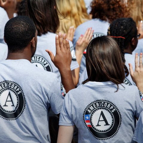 Hundreds of new AmeriCorps volunteers are sworn in for duty at a ceremony, Sept. 12, 2014, on the South Lawn of the White House in Washington. (Photo by J. Scott Applewhite/AP)