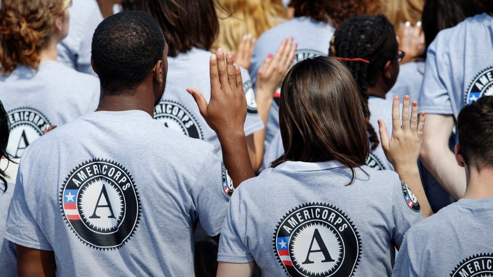 Hundreds of new AmeriCorps volunteers are sworn in for duty at a ceremony, Sept. 12, 2014, on the South Lawn of the White House in Washington. (Photo by J. Scott Applewhite/AP)