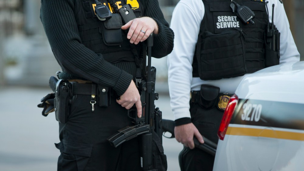 Secret Service police stand guard in Washington, D.C. (Photo by Evan Vucci/AP)