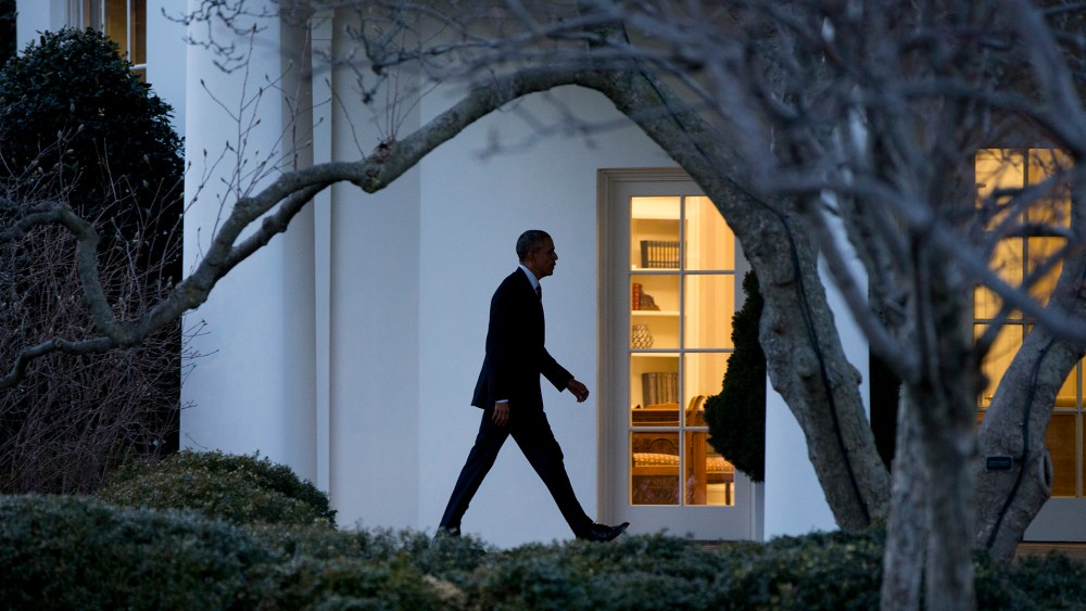 President Barack Obama walks to the Oval Office if the White House in Washington, D.C., Feb. 26, 2016. (Photo by Carolyn Kaster/AP)