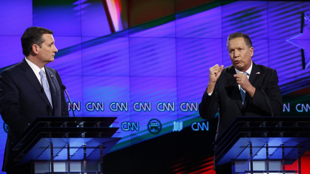 Republican presidential candidate, Ohio Gov. John Kasich, right, speaks as Republican presidential candidate, Sen. Ted Cruz, R-Texas, listens, during the Republican presidential debate on March 10, 2016, in Coral Gables, Fla. (Photo by Wilfredo Lee/AP)
