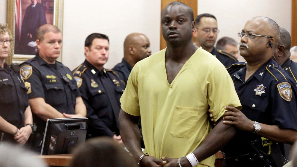 Shannon Miles is escorted out of a courtroom after a hearing on Aug. 31, 2015, in Houston, Texas. (Photo by Pat Sullivan/AP)