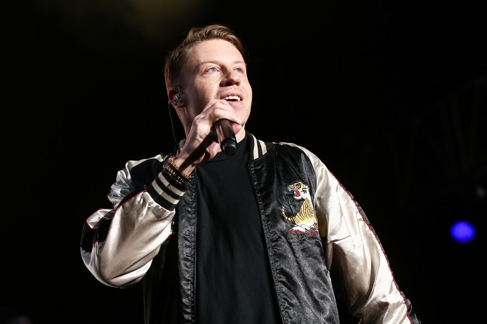 In this Dec. 4, 2015 file photo, Macklemore performs on stage at Power 106's Cali Christmas 2015 in Inglewood, Calif. (Photo by John Salangsang/Invision/AP)