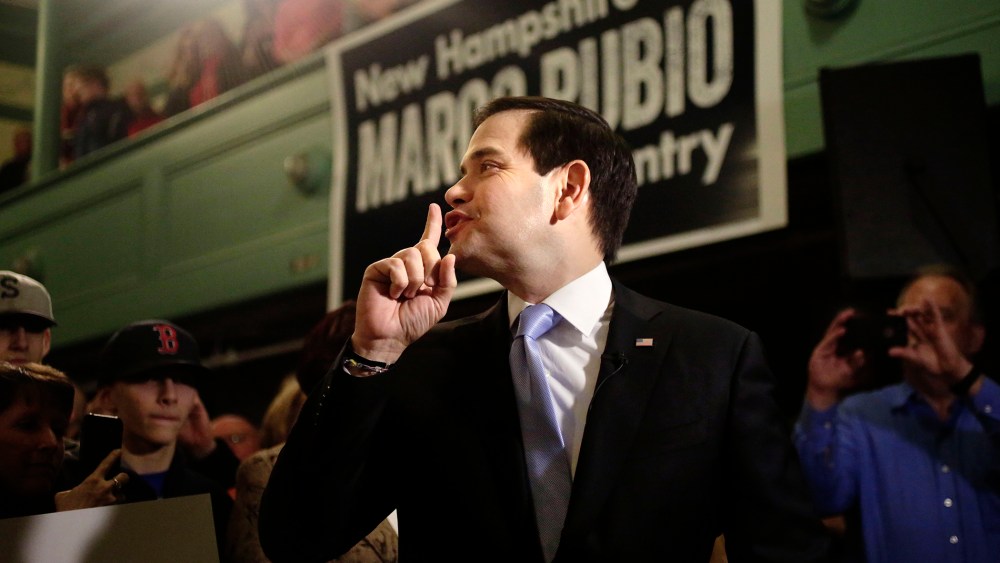 Republican presidential candidate, Sen. Marco Rubio, R-Fla., gestures toward the audience before a television interview before a campaign event, Feb. 2, 2016, at the town hall, in Exeter, N.H. (Photo by Steven Senne/AP)