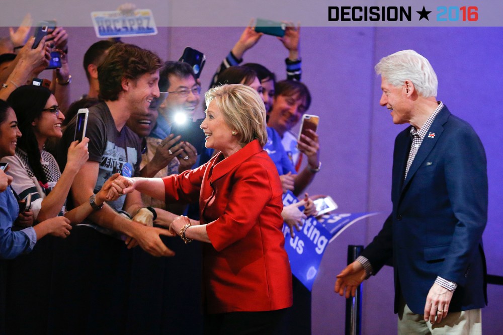Democratic presidential candidate Hillary Clinton greets supporters with her husband and former President Bill Clinton at a Nevada Democratic caucus rally on Feb. 20, 2016, in Las Vegas, Nev. (Photo by John Locher/AP)