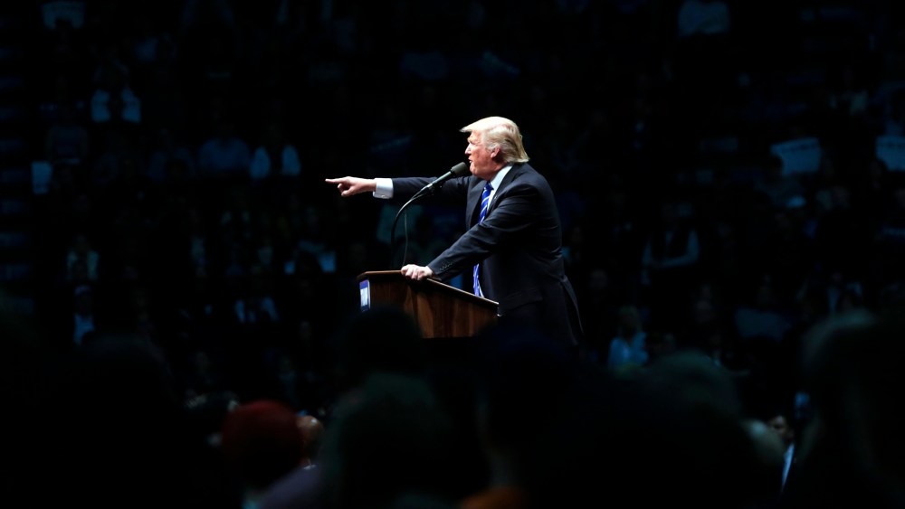 Republican presidential candidate Donald Trump gestures as he speaks during a rally at the Times Union Center on April 11, 2016, in Albany, N.Y.