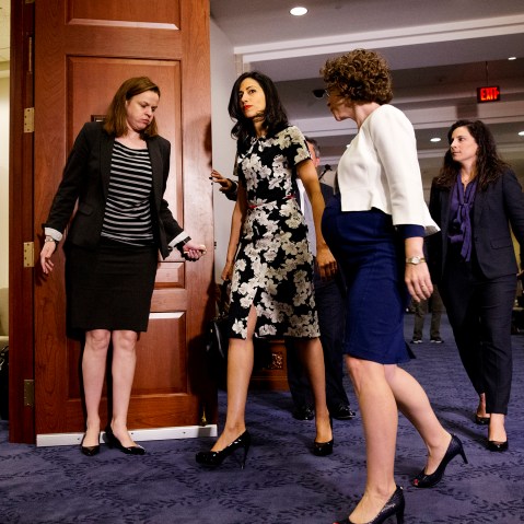 A longtime aide to Democratic presidential candidate Hillary Rodham Clinton returns to a hearing room on Capitol Hill in Washington, Oct. 16, 2015. (Photo by Jacquelyn Martin/AP)