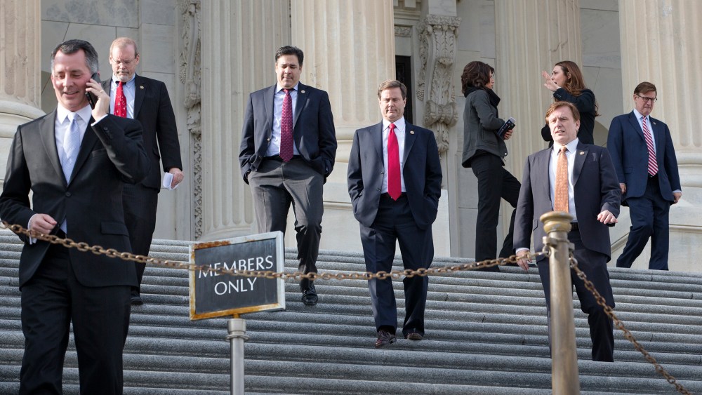 Members of the House of Representatives leave Capitol Hill in Washington, Dec. 11, 2015, after approving a short-term spending bill to keep the government open. (Photo by J. Scott Applewhite/AP)