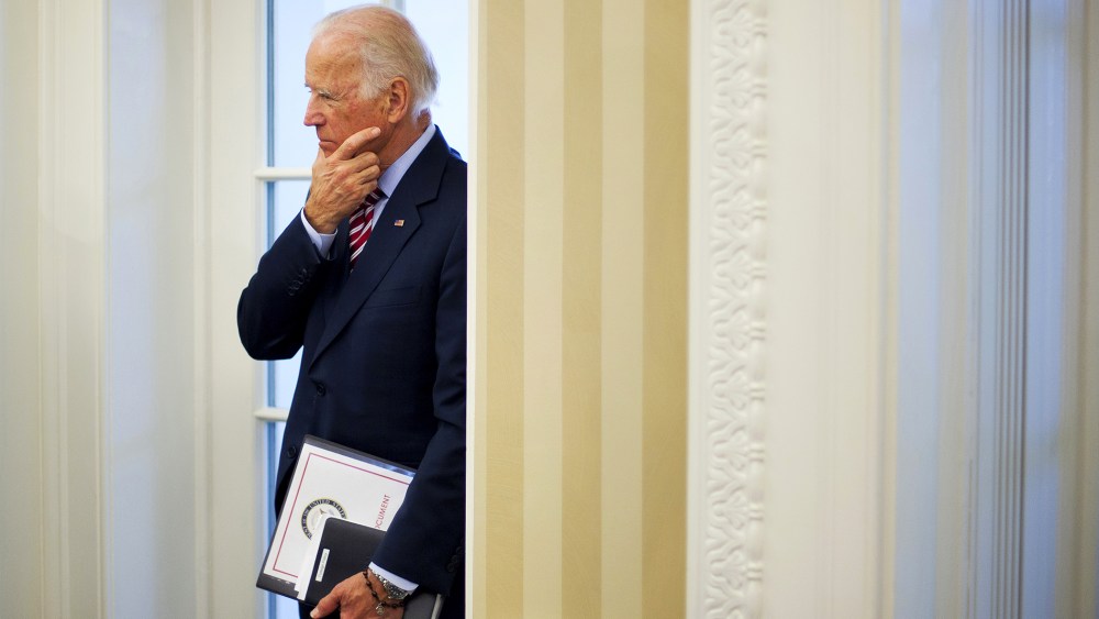 In this May 26, 2015 file photo, Vice President Joe Biden listens to remarks to the media during a meeting between President Barack Obama and NATO Secretary General Jens Stoltenberg in the Oval Office of the White House in Washington, D.C. (Photo by Pablo
