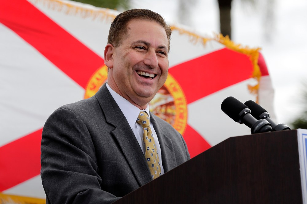 St. Petersburg, Fla., Mayor Rick Kriseman, a candidate at the time, speaks before former Republican Florida Gov. Charlie Crist at a campaign rally, Nov. 4, 2013, in St. Petersburg, Fla.