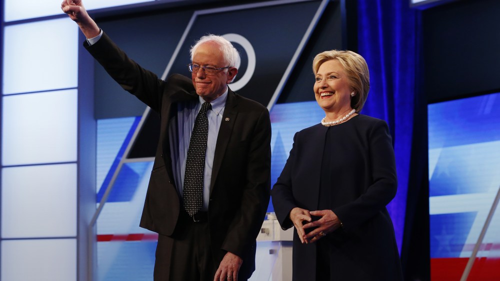 Democratic presidential candidates pose for the audience before the start of the Univision, Washington Post Democratic presidential debate at Miami-Dade College, March 9, 2016, in Miami, Fla. (Photo by Wilfredo Lee/AP)