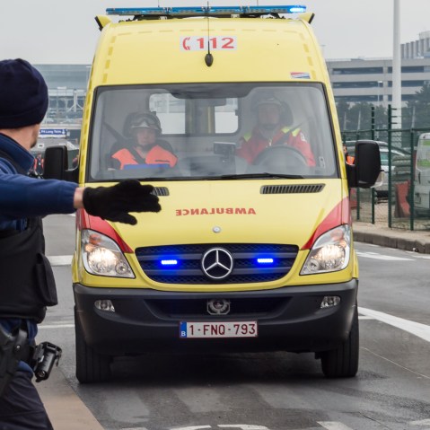 Ambulances arrive to the scene at Brussels airport, after explosions rocked the facility in Brussels, Belgium, March 22, 2016. (Photo by Geert Vanden Wijngaert/AP)