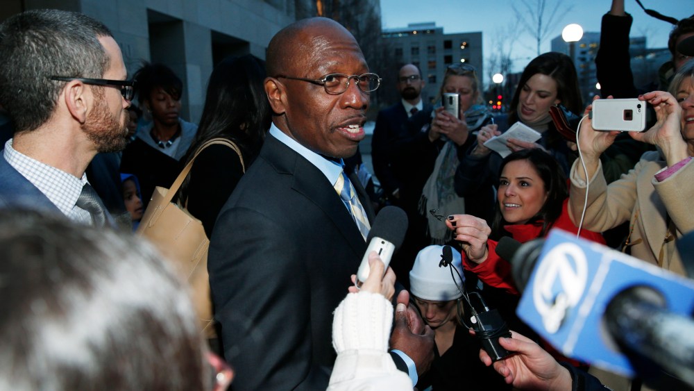 Surrounded by reporters, Clarence Moses-EL talks after being released from Denver County jail on Dec. 22, 2015, in Denver, Co. (Photo by David Zalubowski/AP)