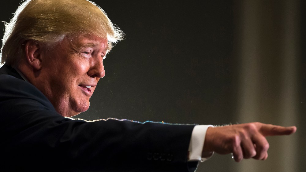Republican presidential candidate Donald Trump points while speaking to the crowd at a campaign stop in Hilton Head Island, S.C., Dec. 30, 2015. (Photo by Stephen B. Morton/AP)