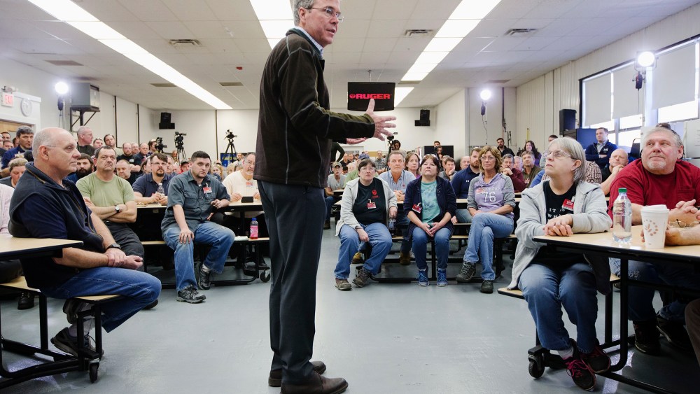 Republican presidential candidate, former Florida Gov. Jeb Bush, center, speaks during a campaign stop at Sturm, Ruger & Co. Inc., Jan. 21, 2016, in Newport, N.H. (Photo by John Minchillo/AP)