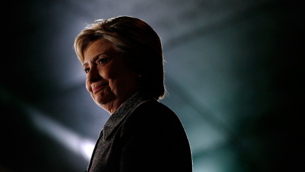 Democratic presidential candidate Hillary Clinton waits to be introduced during a rally at the Riverside Ballroom in Green Bay, Wis., March 29, 2016. (Photo by Patrick Semansky/AP)