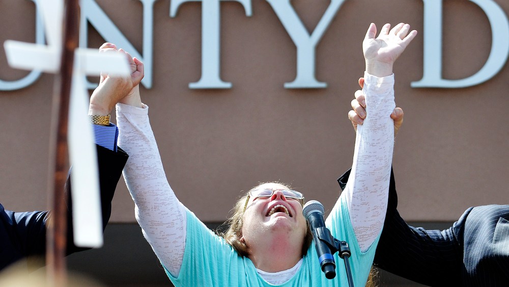 Rowan County Clerk Kim Davis cries out after being released from the Carter County Detention Center, Tuesday, Sept. 8, 2015, in Grayson, Ky. (Photo by Timothy D. Easley/AP)