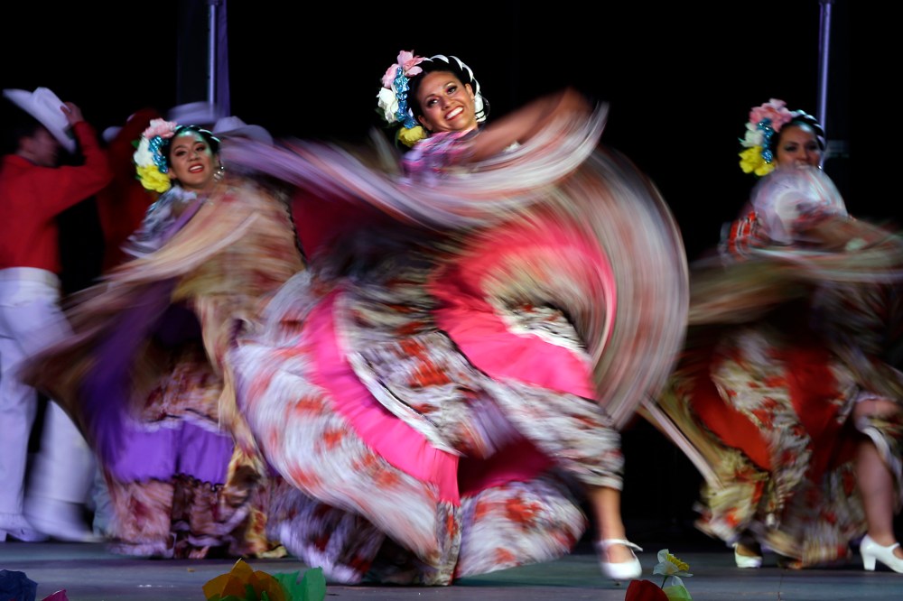 Dancers perform during Cinco de Mayo celebrations in Portland, Ore., May 5, 2015. (Photo by Don Ryan/AP)