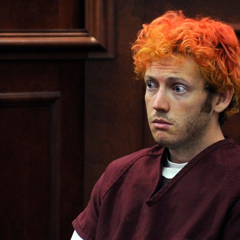James Holmes, who is charged with killing 12 moviegoers and wounding 70 more in a shooting spree in a crowded theatre in Aurora, Colo. in July 2012, sits in Arapahoe County District Court in Centennial, Colo. (Photo by RJ Sangosti/Denver Post/AP).