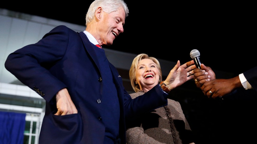 Democratic presidential candidate Hillary Clinton and her husband, former President Bill Clinton, speak at a "Get Out The Vote Rally" in Columbia, S.C., Feb. 26, 2016. (Photo by Gerald Herbert/AP)