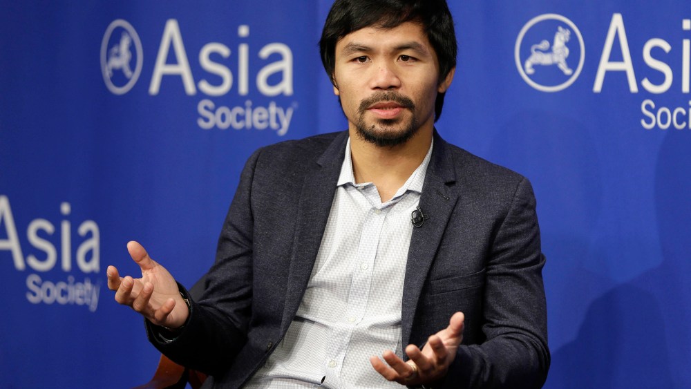 In this Oct. 12, 2015, file photo, Manny Pacquiao takes questions at the Asia Society in New York. (Photo by Seth Wenig/AP)