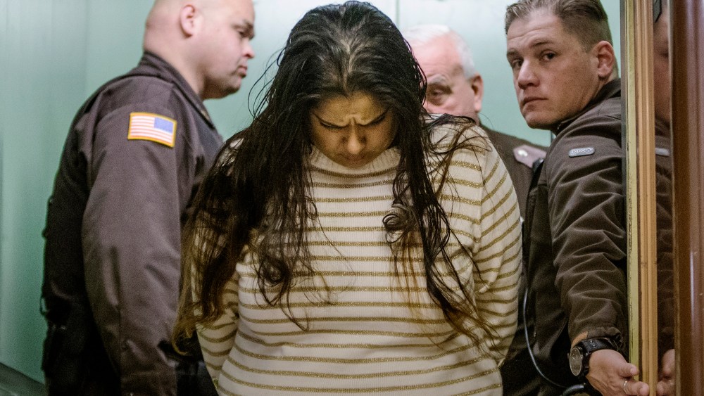 Purvi Patel is taken into custody after being sentenced to 20 years in prison for feticide and neglect of a dependent, at the St. Joseph County Courthouse in South Bend, Ind., March 30, 2015. (Photo by Robert Franklin/South Bend Tribune/AP)