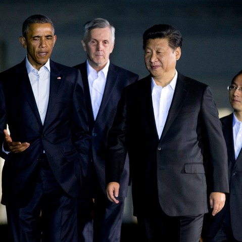 President Barack Obama and Chinese President Xi Jinping, front right, walk from the West Wing of the White House in Washington, Sept. 24, 2015. (Photo by Manuel Balce Ceneta/AP)