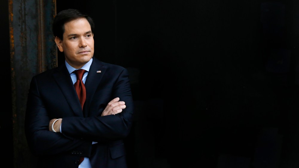 Republican presidential candidate Sen. Marco Rubio waits to speak at a caucus site on Feb. 1, 2016 in Clive, Iowa. (Photo by Paul Sancya/AP)