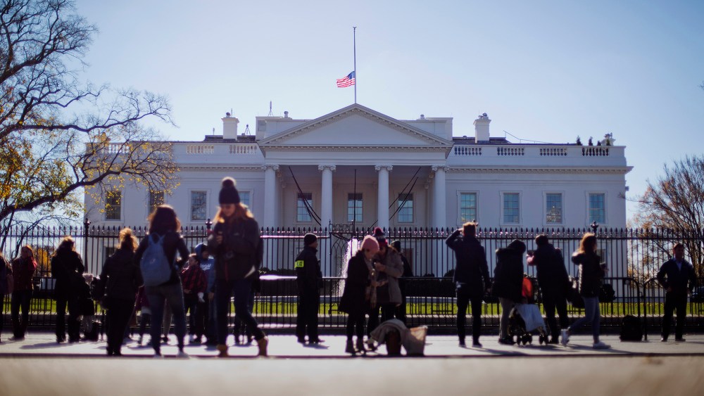 An American flag is seen at half-staff above the White House in Washington, Dec. 3, 2015. (Photo by Pablo Martinez Monsivais/AP)