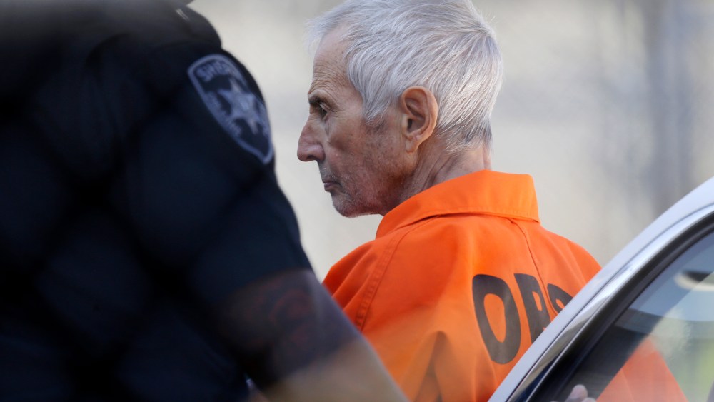 Robert Durst is escorted into Orleans Parish Prison after his arraignment in Orleans Parish Criminal District Court in New Orleans, March 17, 2015. (Photo by Gerald Herbert/AP)