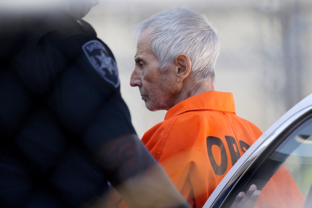 Robert Durst is escorted into Orleans Parish Prison after his arraignment in Orleans Parish Criminal District Court in New Orleans, March 17, 2015. (Photo by Gerald Herbert/AP)