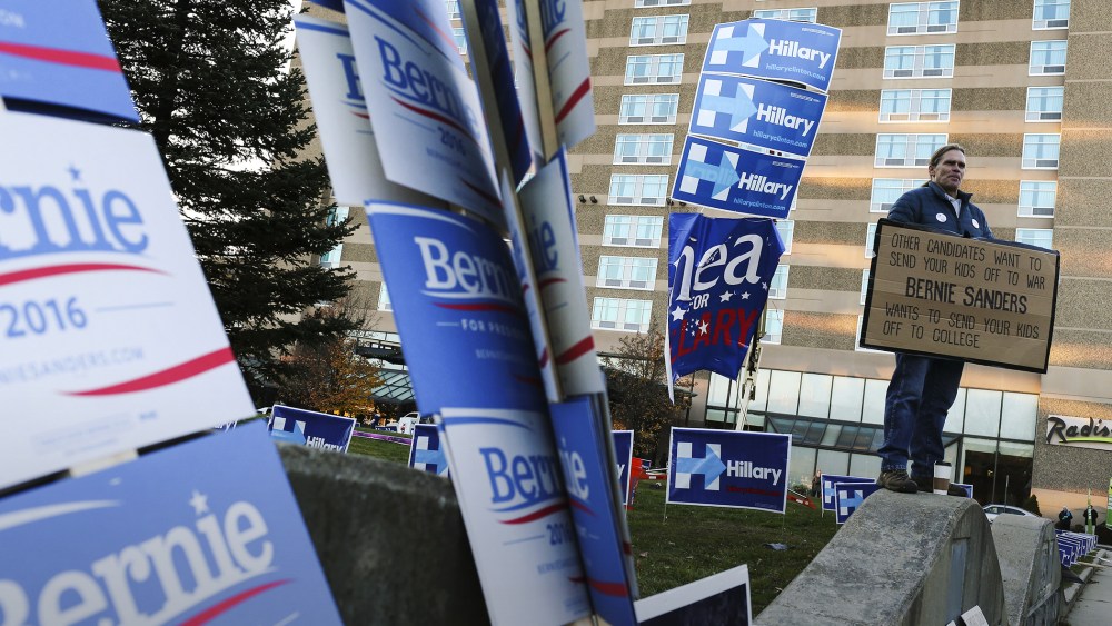 Supporters' signs rest outside of the New Hampshire Democratic Party's annual Jefferson Jackson dinner in Manchester, N.H., Nov. 29, 2015. (Photo by Cheryl Senter/AP)