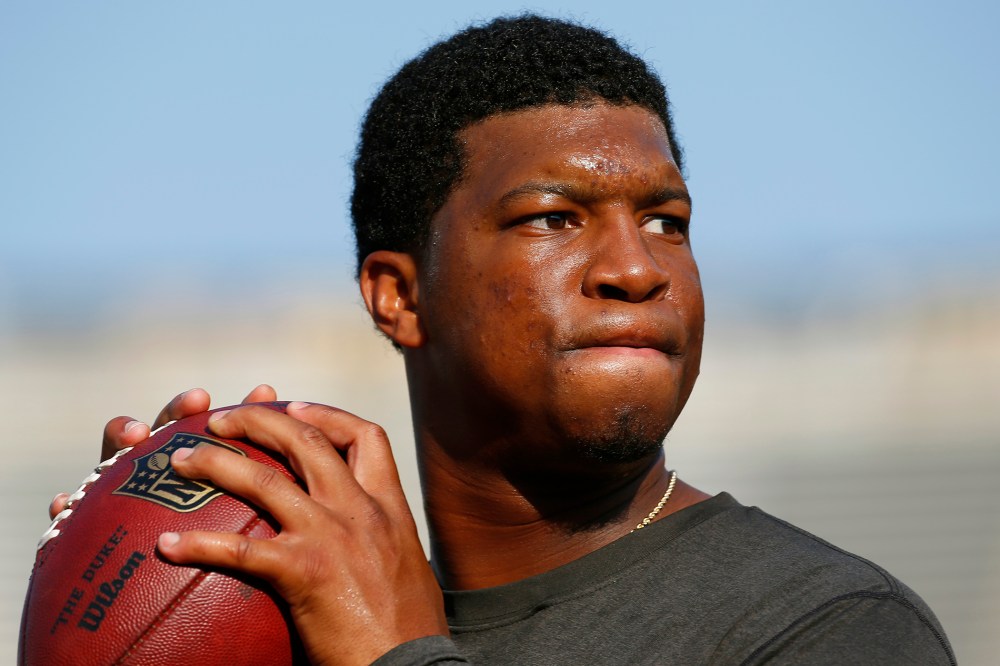 In this Aug. 15, 2015, file photo, Tampa Bay Buccaneers quarterback Jameis Winston warms up before a preseason NFL game. (Photo by Paul Sancya/AP)
