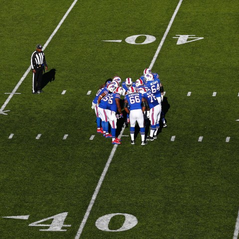 The Buffalo Bills huddle during an NFL football game against the Miami Dolphins at Ralph Wilson Stadium on Sunday, Nov. 8, 2015 in Orchard Park, N.Y. (Photo by Aaron M. Sprecher/AP)