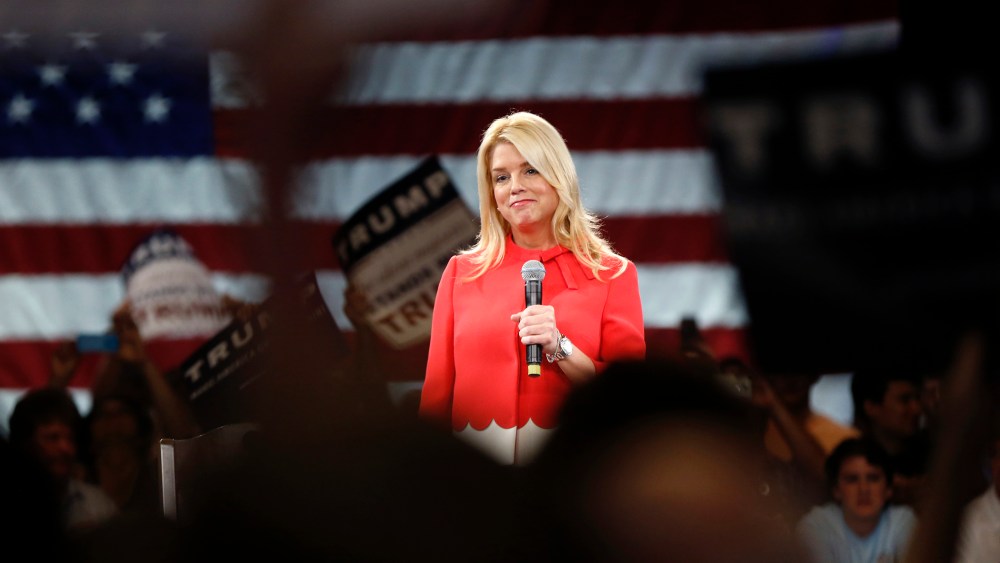 Fla. Attorney General Pam Bondi makes introductory remarks for Republican presidential candidate Donald Trump, before Trump arrives at a campaign event in Tampa, Fla. on March 14, 2016. (Photo by Gerald Herbert/AP)