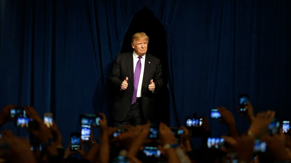 Republican presidential candidate Donald Trump arrives for a caucus night rally, Feb. 23, 2016, in Las Vegas. (Photo by Jae C. Hong/AP)