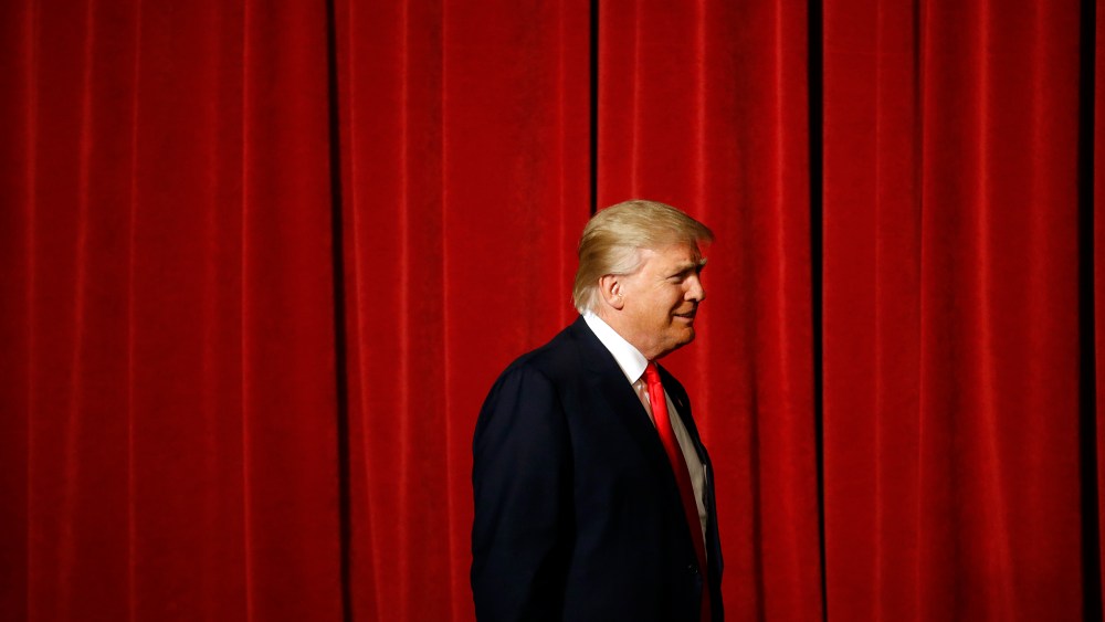 Republican presidential candidate Donald Trump walks onstage for a rally at the Surf Ballroom in Clear Lake, Iowa, Jan. 9, 2016. (Photo by Patrick Semansky/AP)