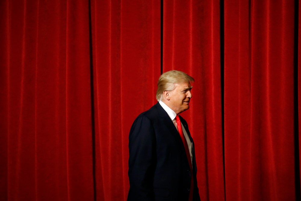 Republican presidential candidate Donald Trump walks onstage for a rally at the Surf Ballroom in Clear Lake, Iowa, Jan. 9, 2016. (Photo by Patrick Semansky/AP)