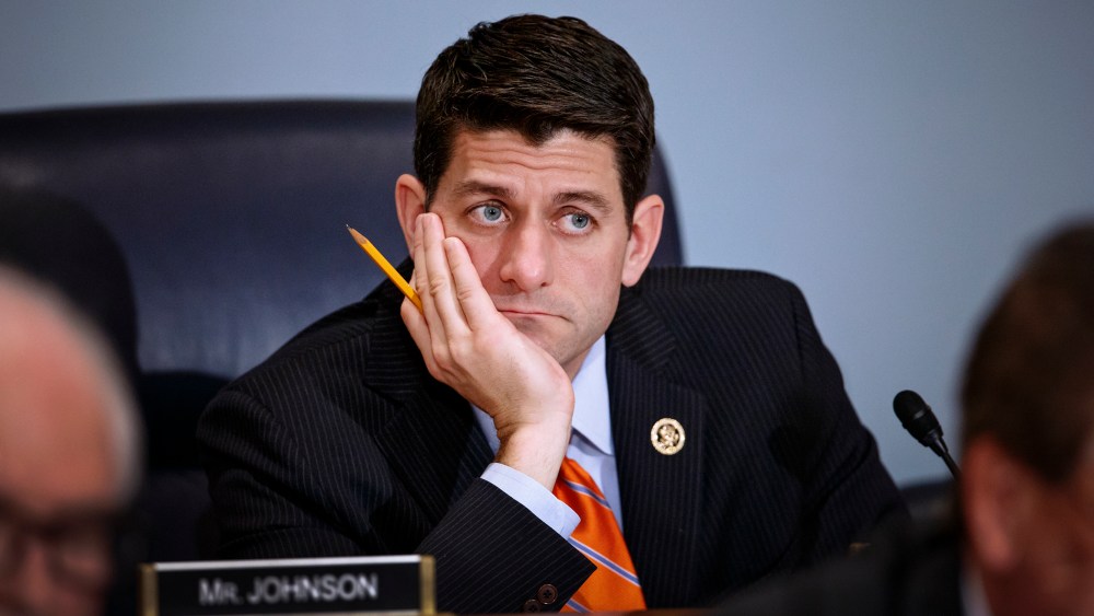 House Ways and Means Committee Chairman Paul Ryan, R-Wisc., listens as Treasury Secretary Jack Lew defends President Barack Obama's new budget proposals, on Capitol Hill in Washington, Feb. 3, 2015. (Photo by J. Scott Applewhite/AP)
