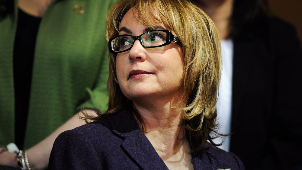 Former Arizona U.S. Rep. Gabby Giffords listens, during a news conference at the state Capitol, March 17, 2015, in Hartford, Conn. (Photo by Jessica Hill/AP)