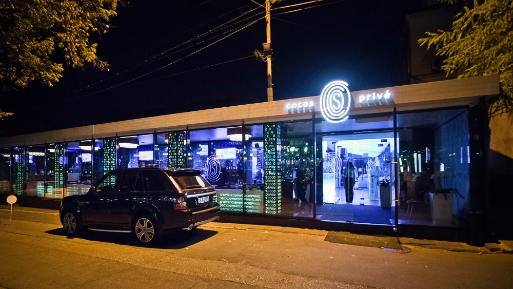 In this Oct. 5, 2015 photo, an imported luxury SUV is parked outside the Cocos Prive club in Chisinau, Moldova. (Photo by AP)