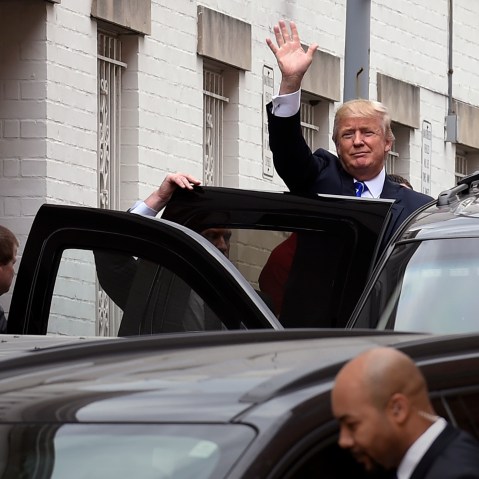 Republican presidential candidate Donald Trump waves as he gets into his vehicle in Washington, March 31, 2016, following a meeting at the Republican National Committee. (Photo by Susan Walsh/AP)