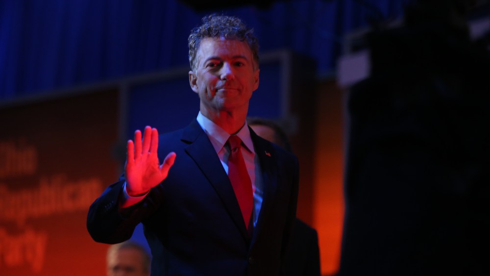 Republican presidential candidate Sen. Rand Paul, R-Ky., waves during the first Republican presidential debate at the Quicken Loans Arena, Aug. 6, 2015, in Cleveland. (Photo by Andrew Harnik/AP)