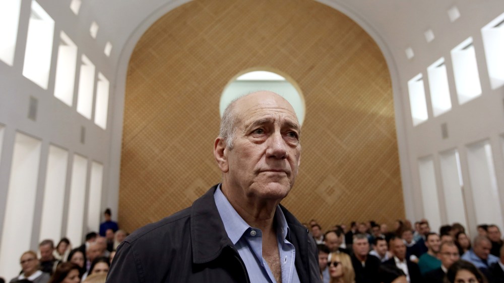 Former Israeli prime minister Ehud Olmert is seen in the court room as he waits for the judges at the Supreme Court in Jerusalem on Dec. 29, 2015. (Photo by Gali Tibbon/Pool/AP)