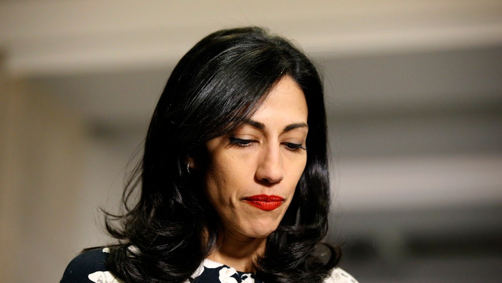 Huma Abedin, a longtime aide to Hillary Rodham Clinton, pauses while speaking to the media after testifying at a closed-door hearing of the House Benghazi Committee, on Capitol Hill, Oct. 16, 2015 in Washington, D.C. (Photo by Alex Brandon/AP)