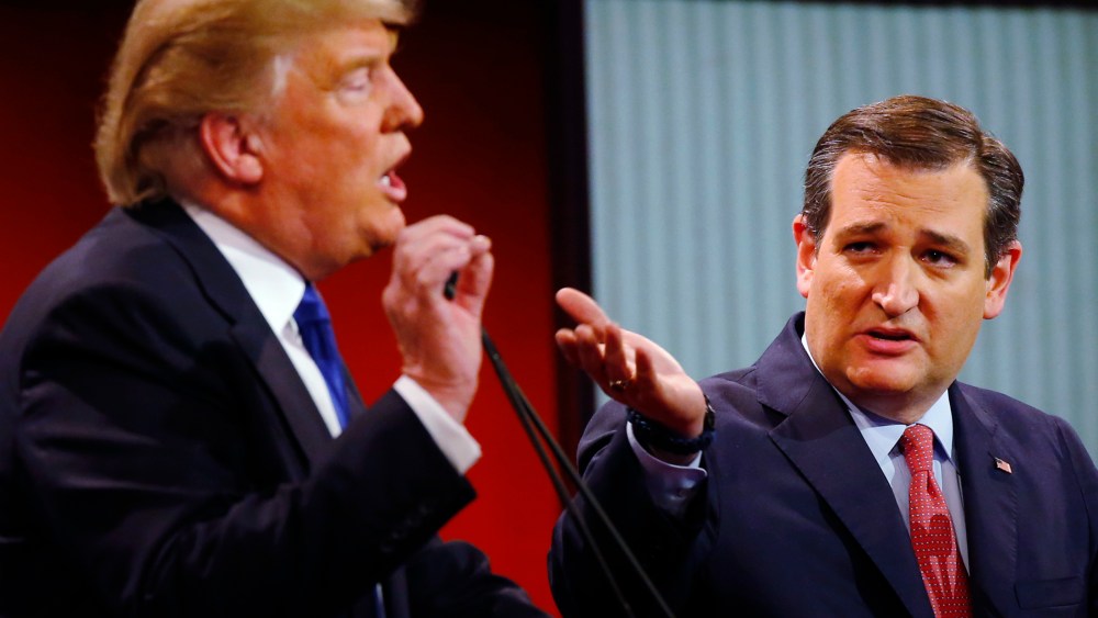 Republican presidential candidates, businessman Donald Trump and Sen. Ted Cruz (R-Texas), argue a point during a debate at Fox Theatre, March 3, 2016, in Detroit. (Photo by Paul Sancya/AP)